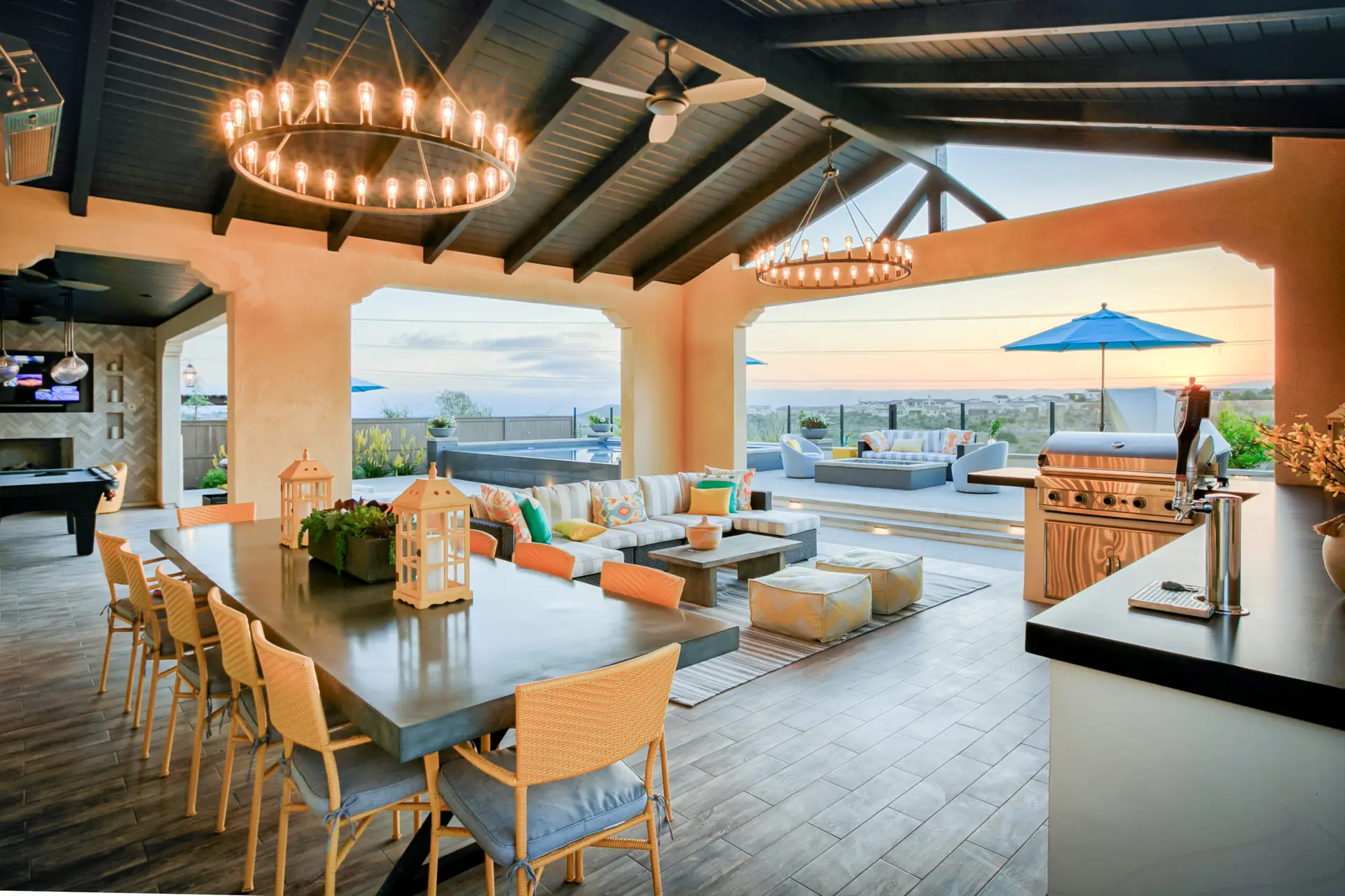 Covered outdoor dining room with chandelier, built by California Smartscape